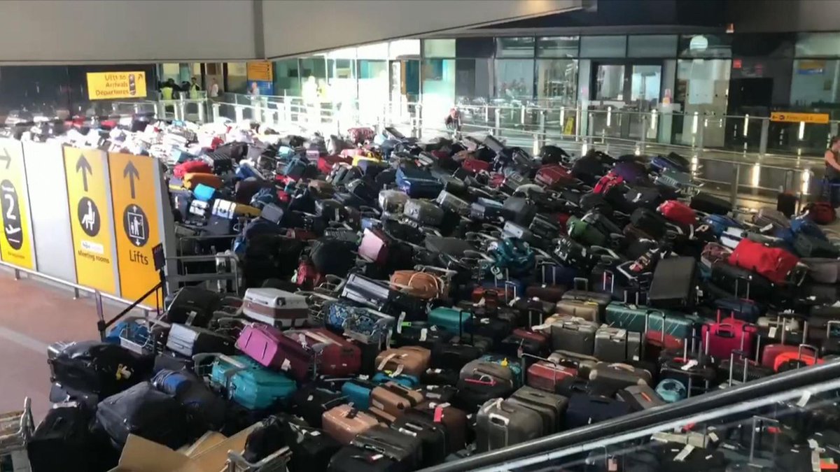 Sea of baggage in Logan while carrier struggles to recover after IT meltdown